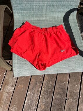 Nike Red Athletic Running Shorts with Silver Swoosh